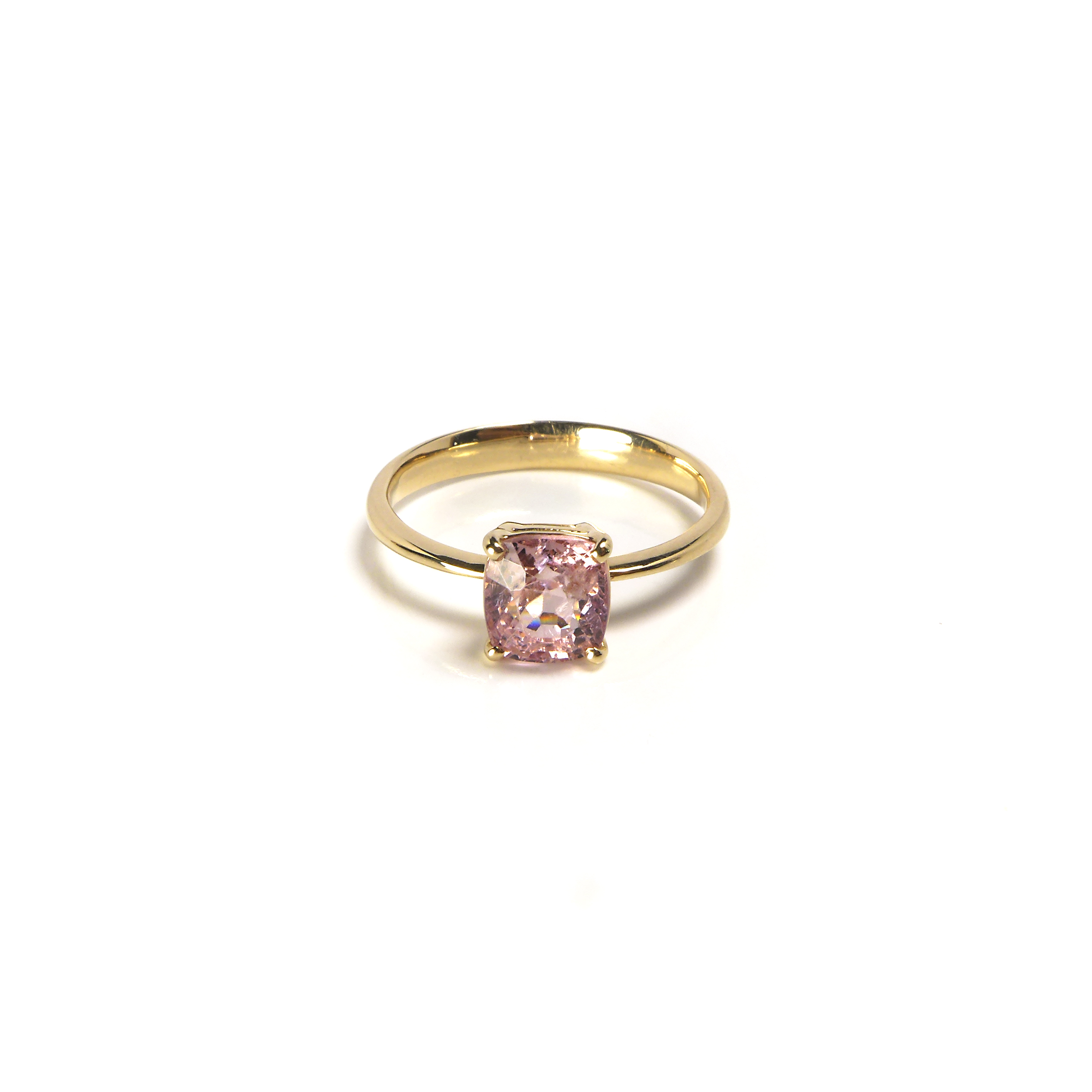 rosegold ring with a big spinell central stone